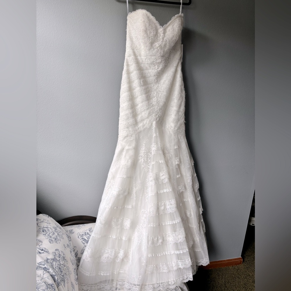 NWT designer wedding dress. Bought from “The White Dress” size 10 never altered - Picture 7 of 16
